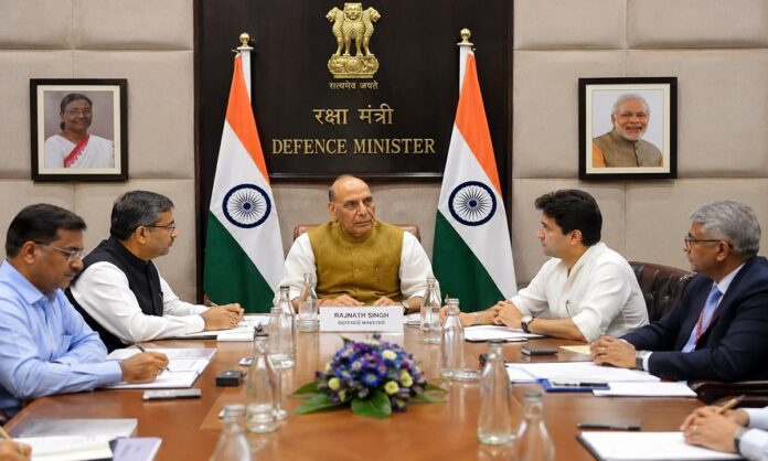 नीट परीक्षा सुरक्षा को लेकर उच्चस्तरीय बैठक करते केंद्रीय मंत्री और अधिकारी (AI Generated Images)